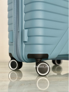 Чемодан American Tourister Flytwist - средний размер - голубой